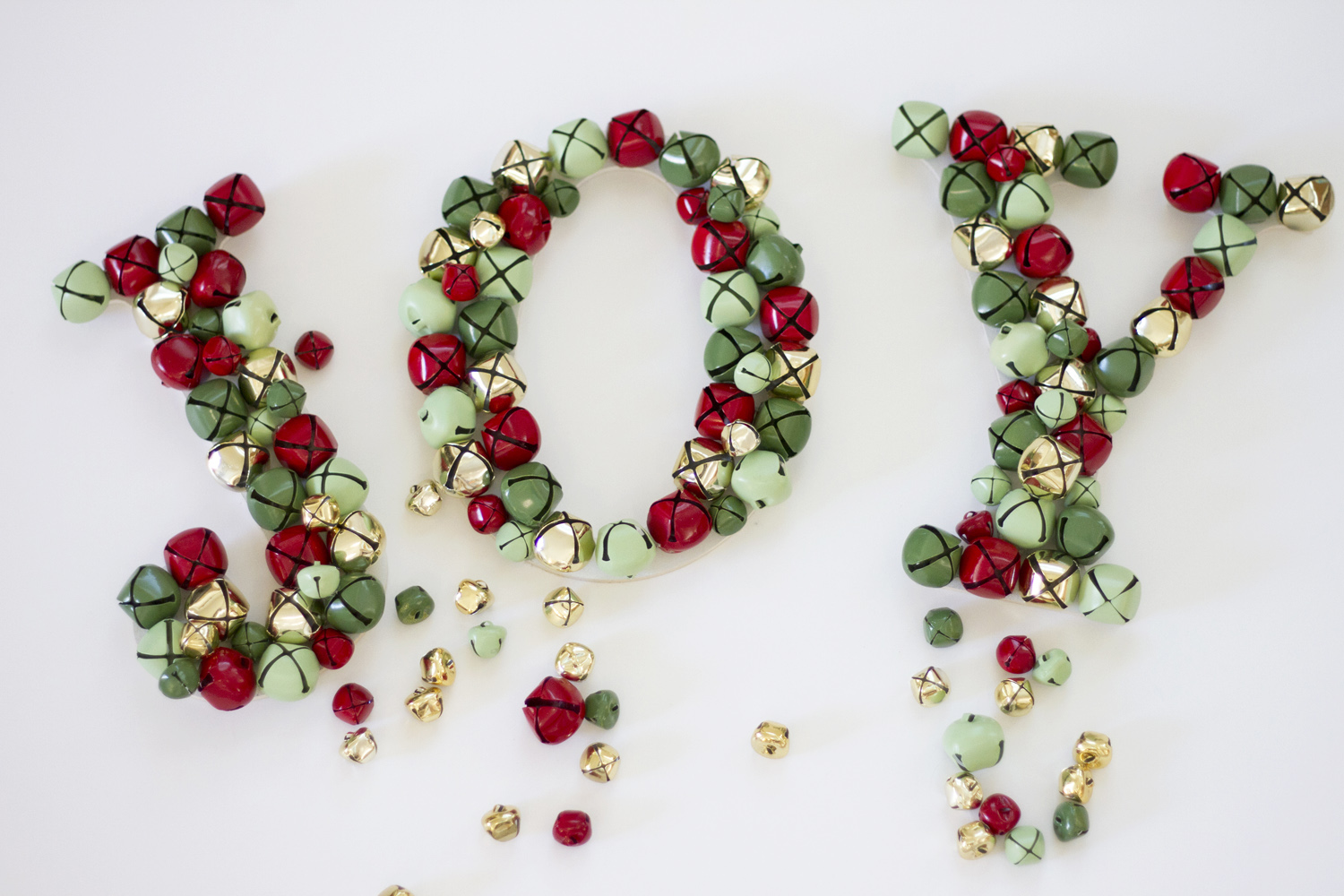 Festive Jingle Bell JOY Letters Decorations featured by Utah lifestyle blog, By Jen Rose