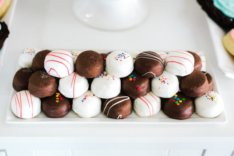 Red Velvet, Salted Caramel, Chocolate Fudge, & Funfetti Cake Bites are a yummy treat at a gender reveal party - Gender Reveal Party Ideas by Utah mom blogger By Jen Rose